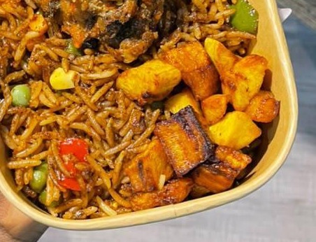 Native rice, ponmo, fish, assorted & boiled egg